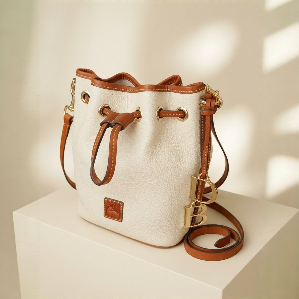 Dooney & Bourke Mini Drawstring Bucket Bone